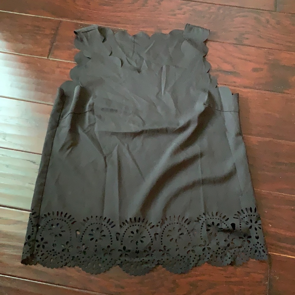 Black laser cut tank top, size small.